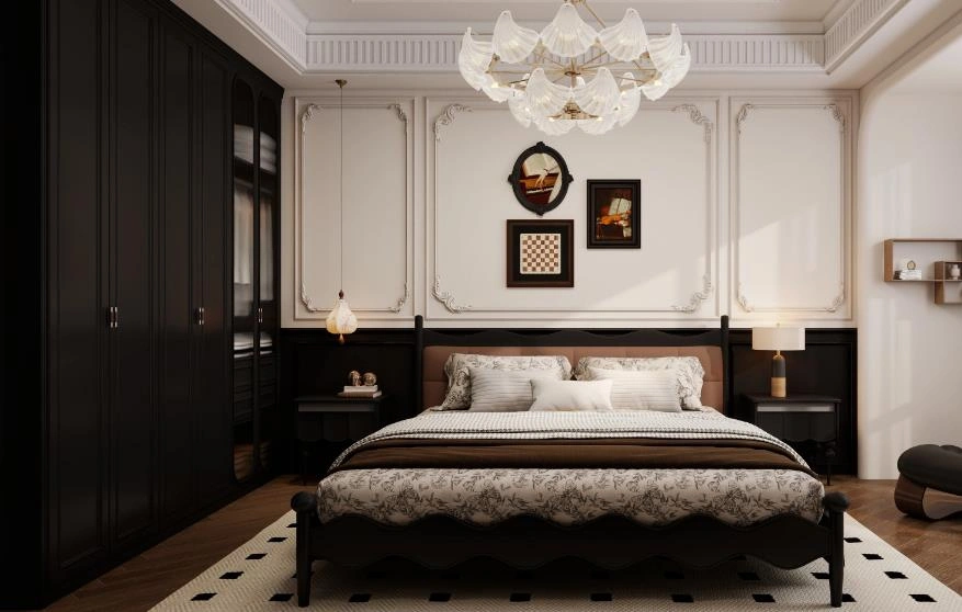 Tiny bedroom designed with a bold black-and-white palette featuring a black wardrobe and monochrome artwork.