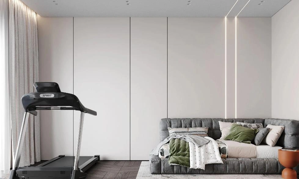 Women&rsquo;s bedroom idea combining a treadmill and sofa bed for both exercise and relaxation.