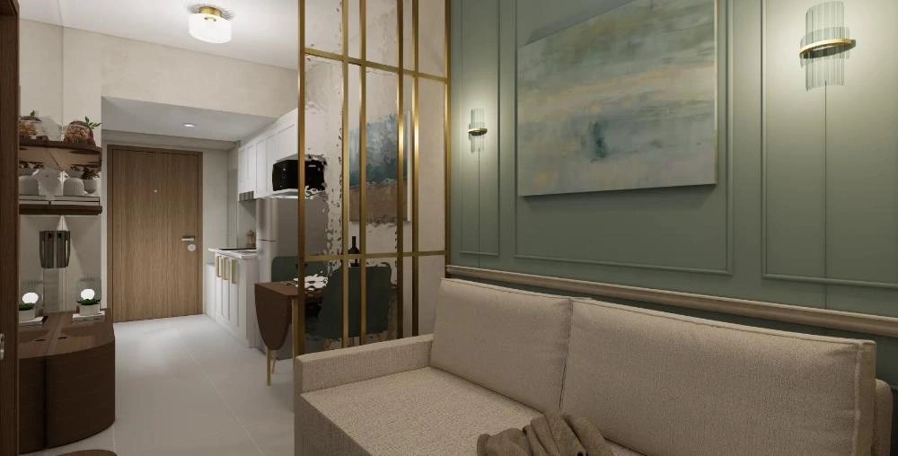 Gold-framed transparent partition creates functional zones while keeping the small living room open.