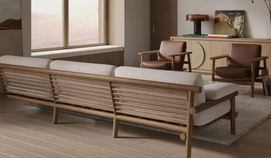 Light oak bench-style sofa with off-white cushions in a small living room.