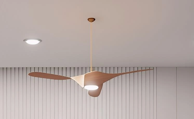 Integrated ceiling fan and light in a loft apartment.