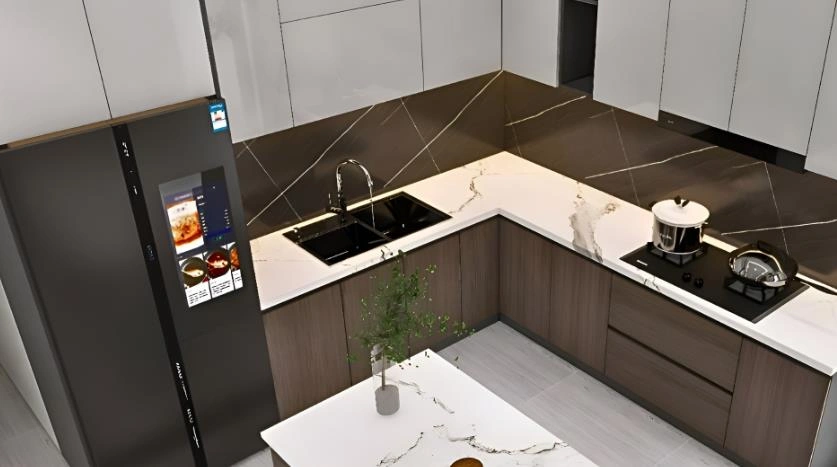 Tiny kitchen with a white marble L-shaped countertop maximizing corner space.
