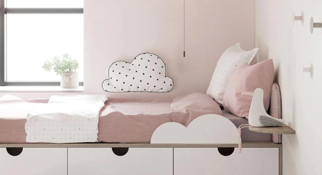 Storage drawers under a child&rsquo;s bed.