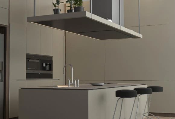Tiny kitchen idea featuring a floating square dark gray metal range hood above an island.