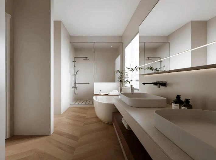Shower, bathtub, and vanity arranged in a linear layout in a small apartment bathroom.