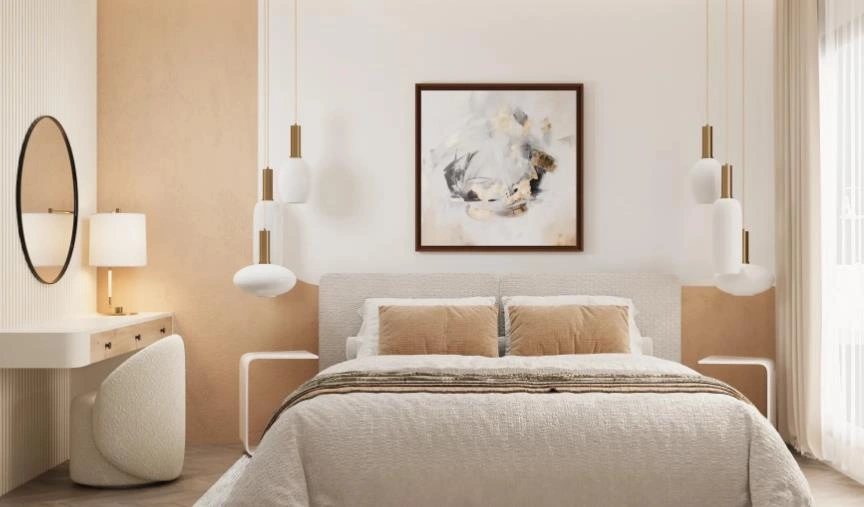 Modern apartment bedroom idea for women featuring a gray headboard, abstract art, and gold-accented lighting.