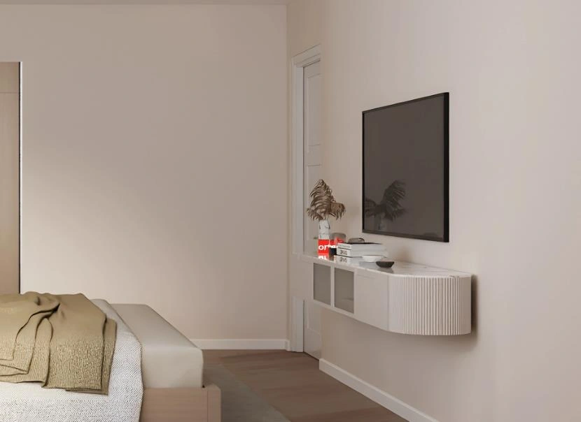 Tiny bedroom with a slim wall-mounted TV and white floating cabinet for a clean, space-saving layout.