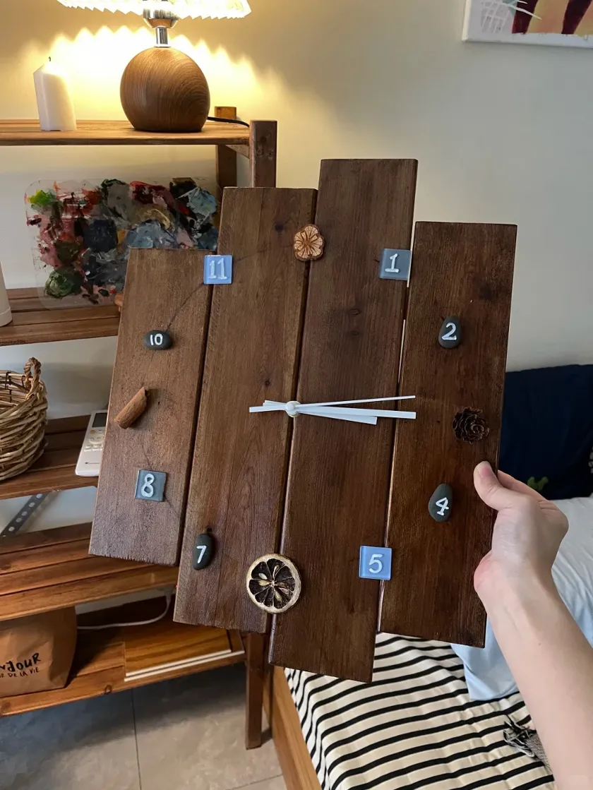 Turning leftover wood scraps from furniture projects into a vintage-style wall clock. The boards are