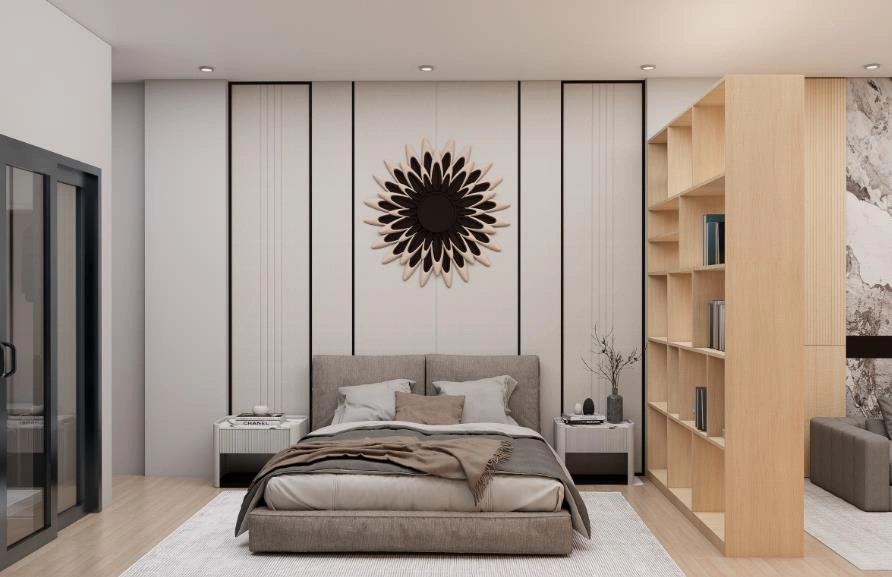A master bedroom using a large wooden bookshelf as a room divider