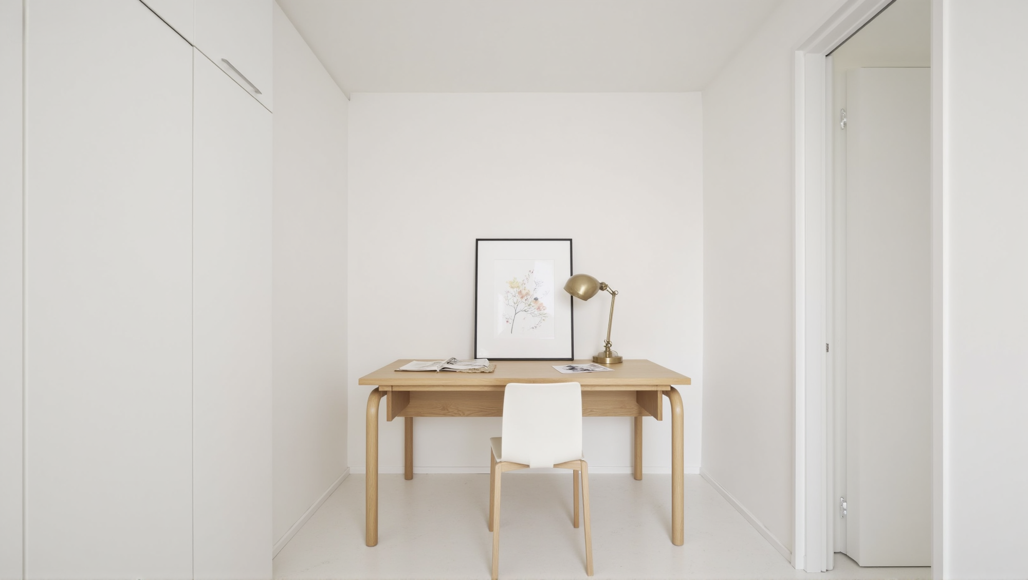 Minimalist study room with clean white walls