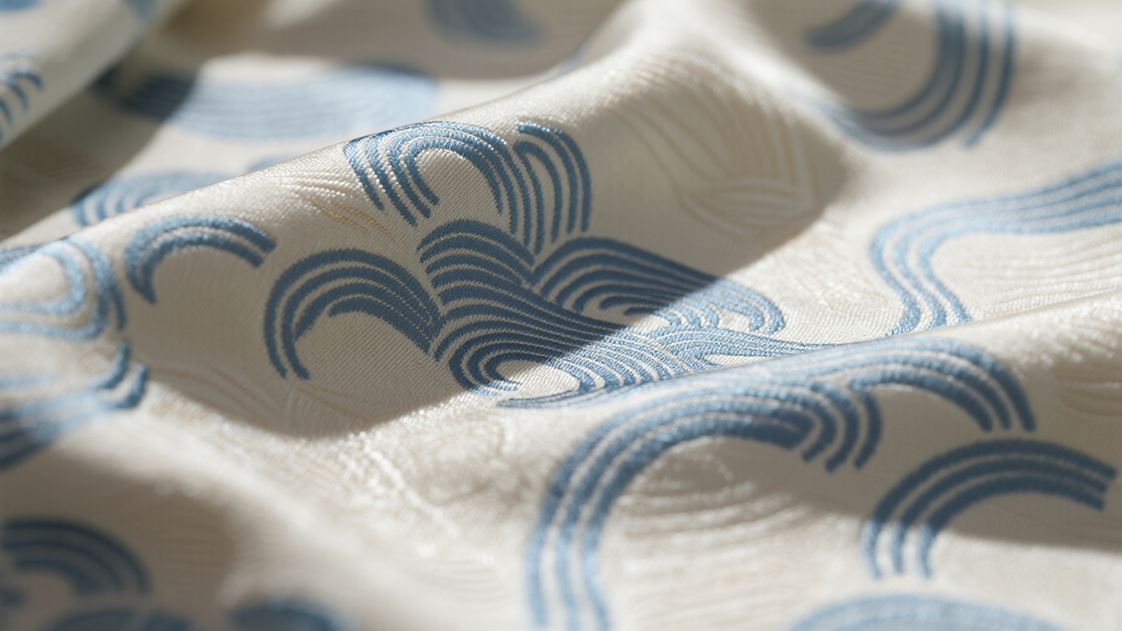 Japanese wave pattern on silk textile close-up