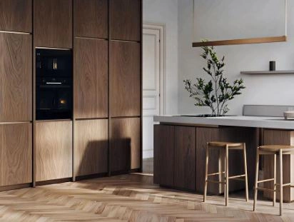 Light-colored herringbone solid wood floor with geometric lines
