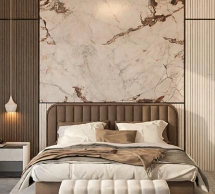 Wood paneling in off-white and light brown is paired with pink-toned marble walls.