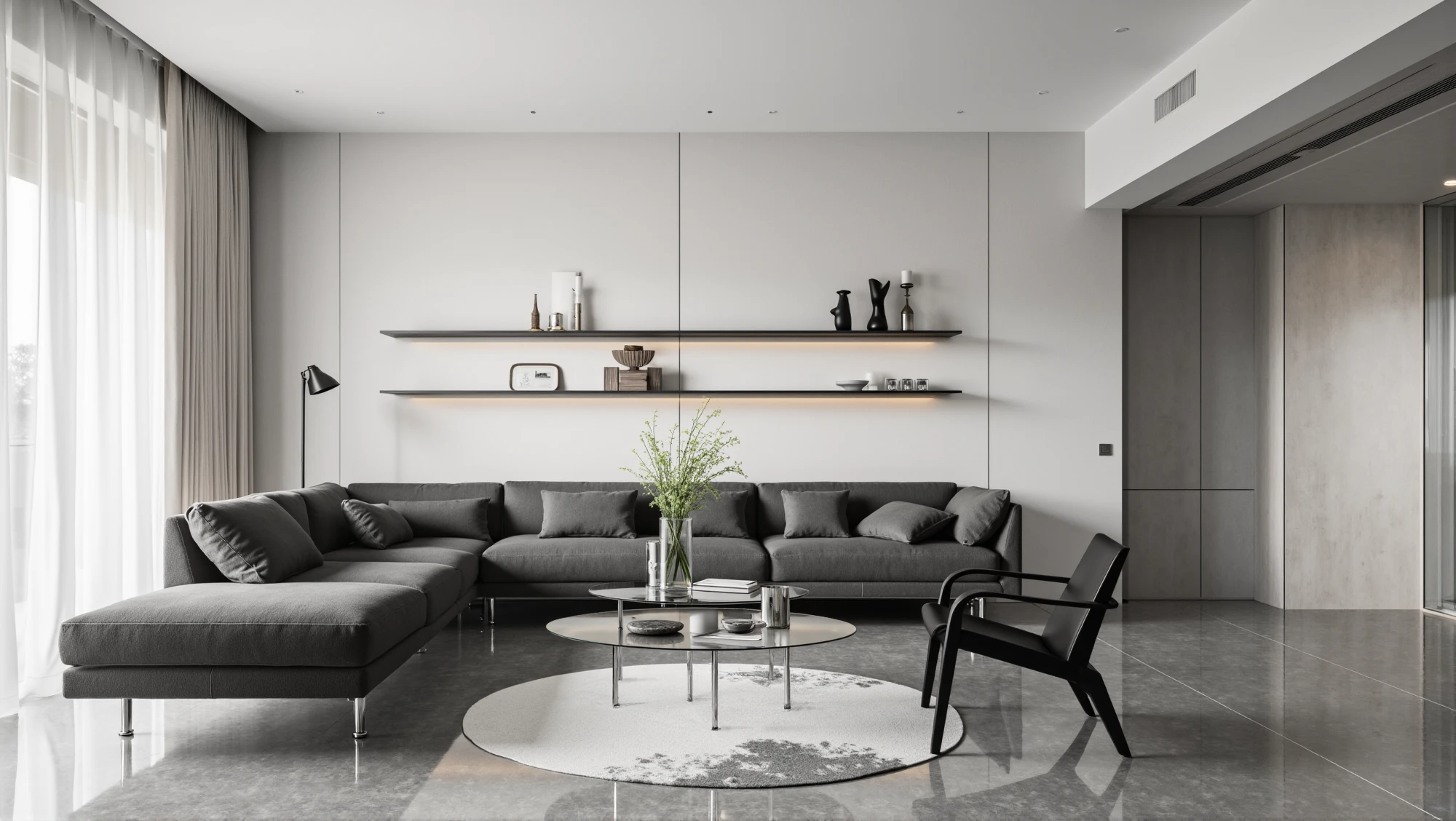 Modern living room with gray tones and glass furniture